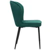 A side view of a single green velvet chair with black metal legs, isolated on a white background. Anteprima dell’immagine prodotto