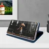 A phone case with a phone displaying a video of a skateboarder is placed on a white surface in front of a grey wall. Náhled obrázku produktu