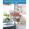 A person's hand holding two clear plastic food storage containers filled with food, inside a refrigerator. Anteprima dell’immagine prodotto