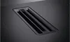 A close-up view of a black induction hob with a built-in downdraft extractor vent. Anteprima dell’immagine prodotto