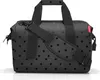 A black duffel bag with a polka dot pattern. Anteprima dell’immagine prodotto