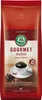 A bag of Lebensbaum Gourmet Kaffee (coffee beans) with a cup of coffee and coffee beans shown on the packaging. Produktbild-Vorschau