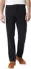 A person wearing black jeans and brown shoes, shown from the waist down against a white background. Produktbild-Vorschau