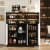 A modern kitchen or dining room sideboard with various items stored inside, illuminated by LED lighting. Produktbild-Vorschau