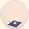 A solar-powered light sphere with a solar panel on its base. Produktbild-Vorschau