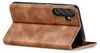 A brown flip case for a smartphone is shown open, revealing the camera array of the phone inside. Produktbild-Vorschau