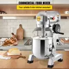 A commercial food mixer is displayed in a kitchen setting, with bread and eggs in the foreground. Produktbild-Vorschau