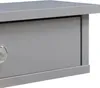 A close-up shot of a gray drawer on a shelf, with a silver knob. Podgląd zdjęcia produktu