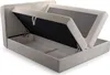 A boxspring bed with its storage compartment open, showing the interior. Produktbild-Vorschau