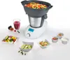 A multi-cooker appliance is shown with various dishes and a smoothie, suggesting a variety of culinary uses. Produktbild-Vorschau