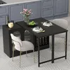 A black dining table with chairs and a sideboard in a kitchen setting. Anteprima dell’immagine prodotto