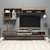 A modern TV stand with a wall-mounted shelf unit, displaying a television and decorative items. Náhľad obrázku produktu