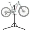 A bicycle repair stand with a bicycle mounted on it, shown against a white background. Náhled obrázku produktu