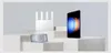 A white router, a black smartphone, and a black tablet are displayed on tiered white blocks against a light gray background. Náhľad obrázku produktu
