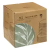 A cardboard box containing a set of plates with a leaf pattern. Anteprima dell’immagine prodotto