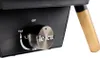 A close-up view of a gas control knob on a black appliance, with a wooden handle visible on the right. Produktbild-Vorschau