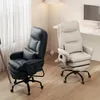 Two ergonomic office chairs, one black and one beige, are shown in a well-lit room with a window and a floor lamp. Náhled obrázku produktu