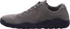 A side view of a single grey sneaker with a black sole against a white background. Produktbild-Vorschau