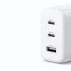 A close-up side view of a white Ugreen CD275 wall charger with three ports. Náhľad obrázku produktu