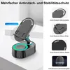 A black and gray phone stand with a speaker base, shown on a light gray surface with a white background. Text overlays describe features. Produktbild-Vorschau
