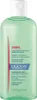 A product shot of a green shampoo bottle with a white cap and a label with text and a red stripe. Podgląd zdjęcia produktu