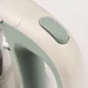 A close-up shot of the handle and a button on a kettle. Anteprima dell’immagine prodotto