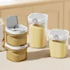 Several transparent food storage containers filled with powder are arranged on a table. Produktbild-Vorschau