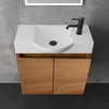 A modern bathroom vanity with a white sink and a black faucet, set against a concrete wall. Produktbild-Vorschau