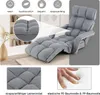 A collage showing a grey floor chair, with close-up views and descriptive icons. Produktbild-Vorschau