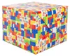 A gift-wrapped box with a colorful, block-themed pattern. Produktbild-Vorschau