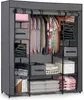 A portable fabric wardrobe with multiple shelves and hanging space, filled with folded clothes and hanging garments. Náhľad obrázku produktu