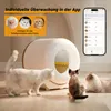 A self-cleaning cat litter box is shown with three cats around it, and a smartphone displaying app control. Náhled obrázku produktu
