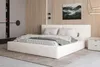 A modern bedroom with a large bed, wardrobe, and artwork. Produktbild-Vorschau