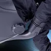 Close-up of a welding helmet's adjustment knob and a strap on a person's arm. Produktbild-Vorschau