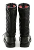 The back view of a pair of black winter boots with red lining. Produktbild-Vorschau