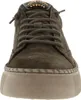 A close-up front view of a brown suede sneaker with laces and decorative embellishments on the tongue. Náhľad obrázku produktu