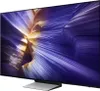 A television set with a colorful abstract image displayed on its screen, shown from a side angle on a stand. Produktbild-Vorschau