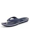 A single navy blue Crocs Crocband Flip sandal is shown on a white background. Produktbild-Vorschau