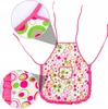 A child's apron with a colorful circle pattern. Náhled obrázku produktu