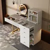A modern white vanity table with a lighted mirror and storage drawers, set in a well-lit room. Anteprima dell’immagine prodotto