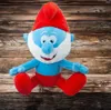 A plush toy of Papa Smurf sitting on a wooden background. Produktbild-Vorschau