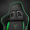 Close-up of the headrest and upper back of a black gaming chair with green trim and branding. Náhľad obrázku produktu