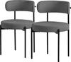 Two gray upholstered chairs with black metal legs are shown against a white background.