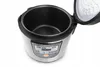 An open electric multi-cooker with its lid lifted, showing the interior pot and control panel. Produktbild-Vorschau