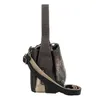 A side view of a handbag with a shoulder strap. Anteprima dell’immagine prodotto