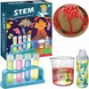 A collage of images showing a science experiment kit, including a box with illustrations, test tubes, a beaker, and a model volcano erupting. Náhled obrázku produktu