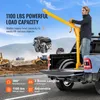 A yellow pickup truck crane is lifting an engine in a construction site. Anteprima dell’immagine prodotto