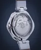 The back of a watch with its internal mechanism visible through a transparent case. Náhled obrázku produktu