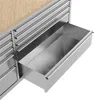 A close-up view of a metal tool chest with one drawer pulled out, revealing its interior. Produktbild-Vorschau