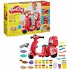A Play-Doh Pizza Delivery Scooter Set is shown, with the product packaging in the upper portion and the product itself with accessories in the lower portion. Produktbild-Vorschau
